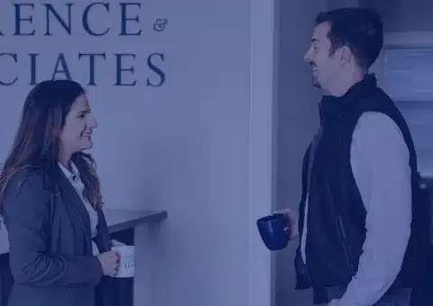 Justin Lawrence talking to a woman