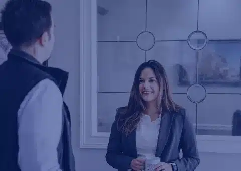Lawrence talking to a woman