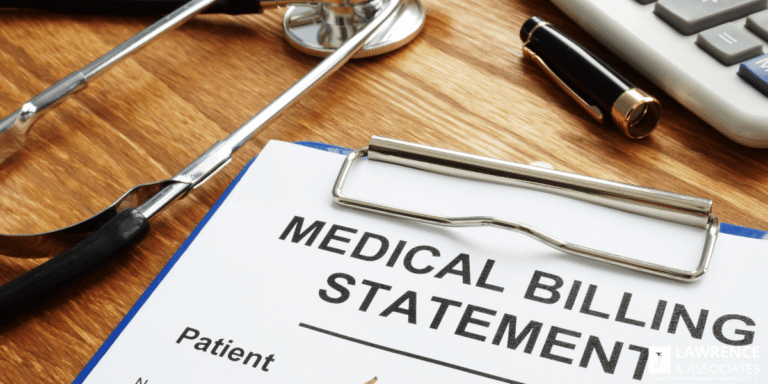 Medical billing statement on a table next to stethescope