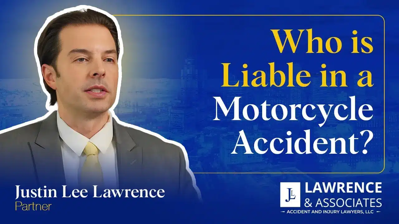 Attorney Justin Lee Lawrence headshot next to thumbnail text "who is liable in a motorcycle accident"