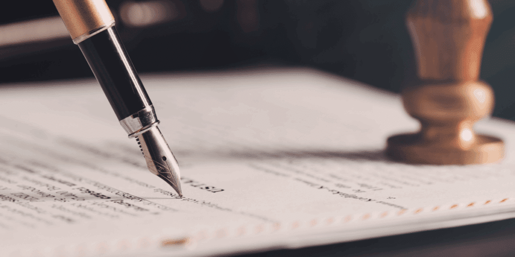 Closeup of pen writing on paper