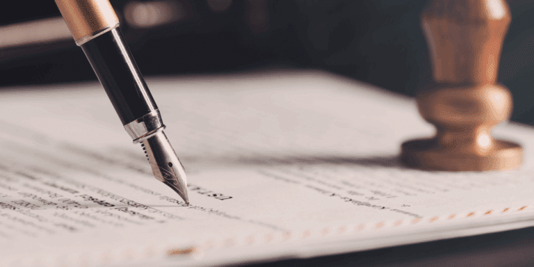 Closeup of pen writing on paper