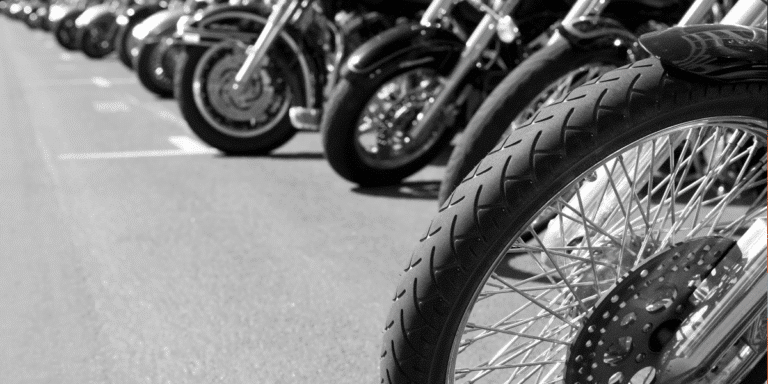 Close up of a row of motorcycle front tires