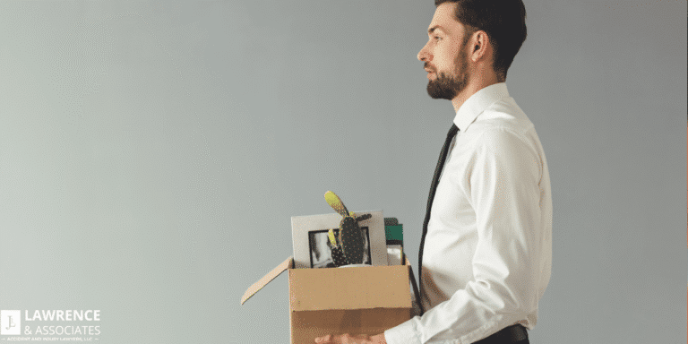 Man holding box of office supplies