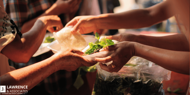 Close up of hands reaching out with food