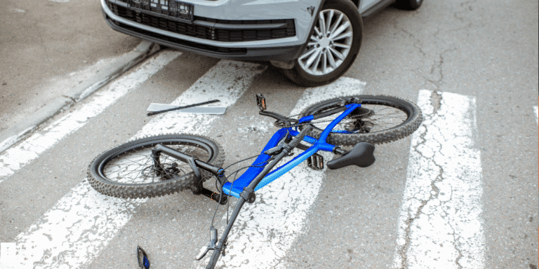 Bicycle on the ground after an acccident